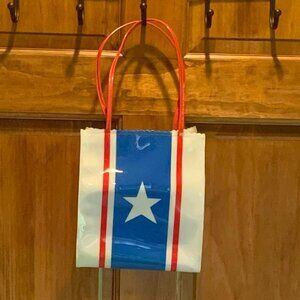LIZ CLAIBORNE POLYVINYL BAG WHITE WITH RED STRAPS, BLUE ACCENT AND WHITE STAR